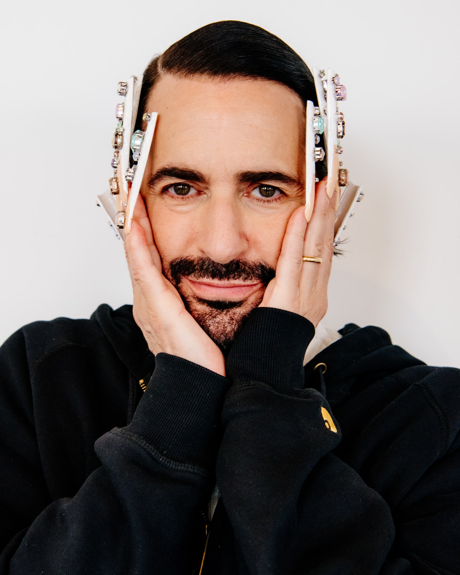 Image may contain Marc Jacobs Face Head Person Photography Portrait Body Part Finger Hand Accessories and Jewelry