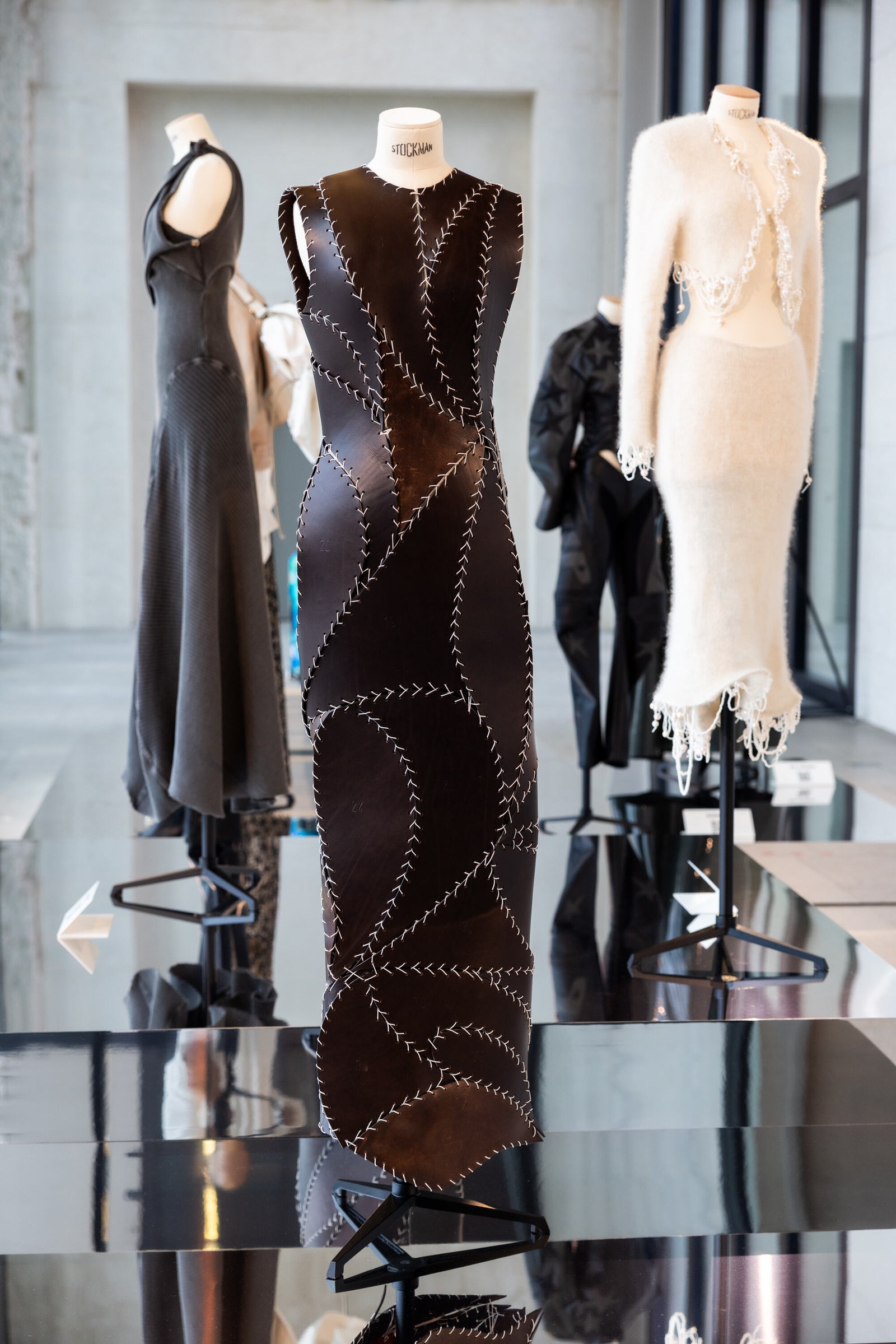 Image may contain Adult Person Wedding Clothing Dress Evening Dress Formal Wear and Mannequin